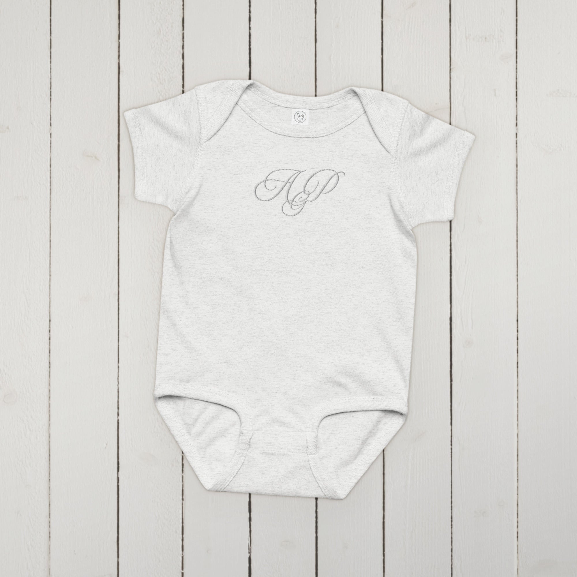 Elegant embroidered monogram Baby jersey bodysuit