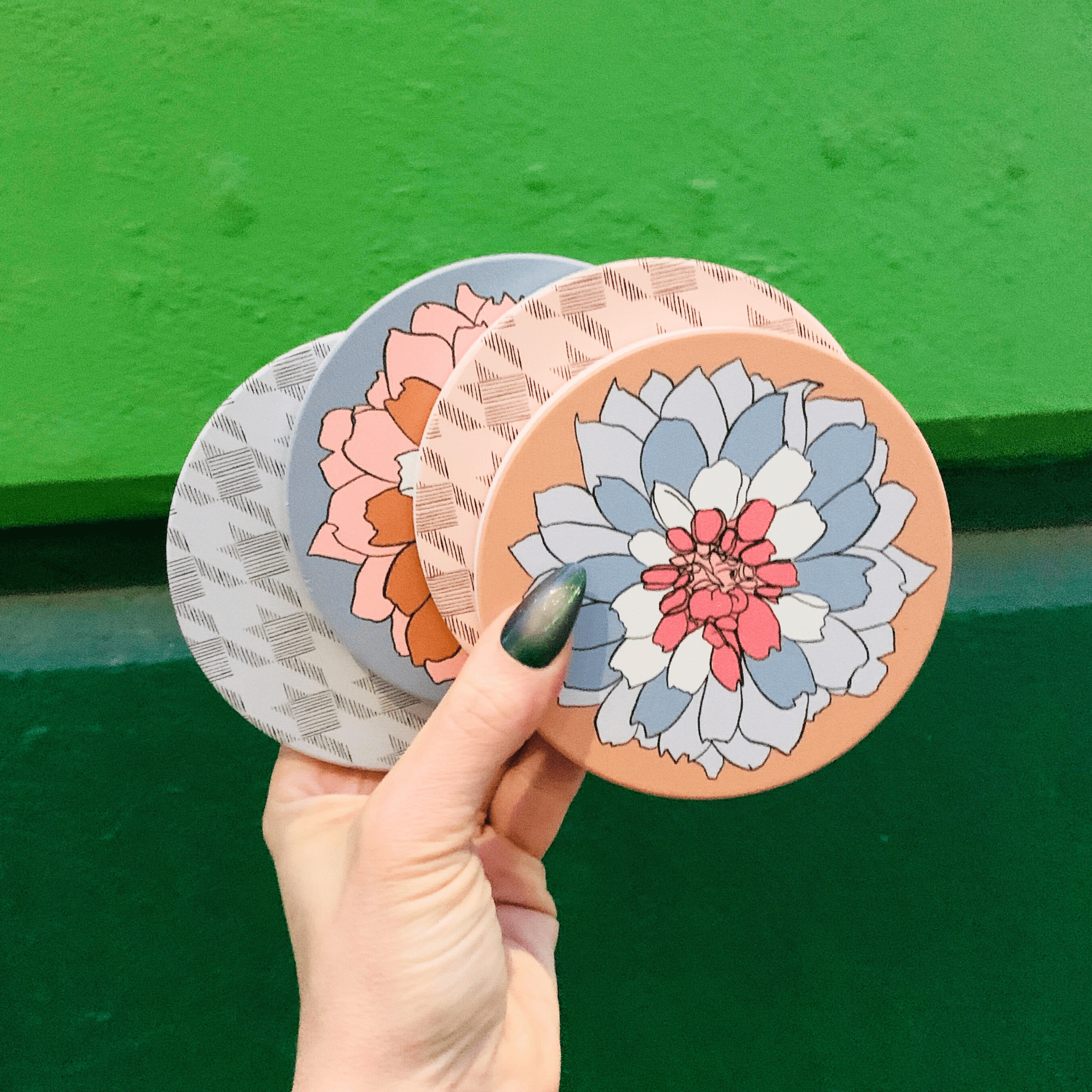 A coasters and door mats shop collection featuring unique, multicultural gifts and apparel