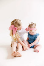 Pink Solid Oversized Bow by Evie Pearl Handmade