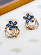 Shining Diva Rose Gold-Polished Blue Floral Studs Earrings