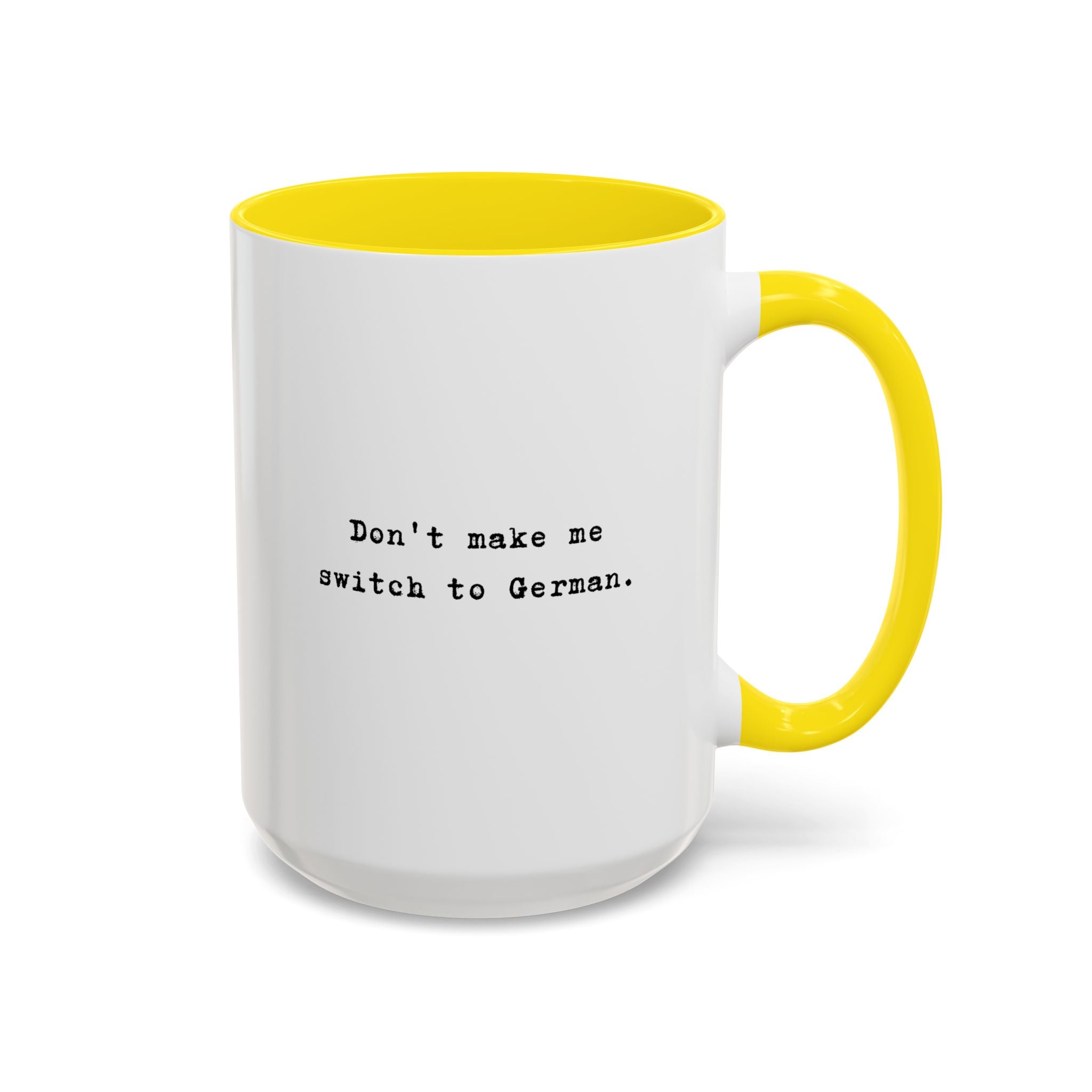 Don't Make Me Switch to German coffee mug with colorful interior and handle