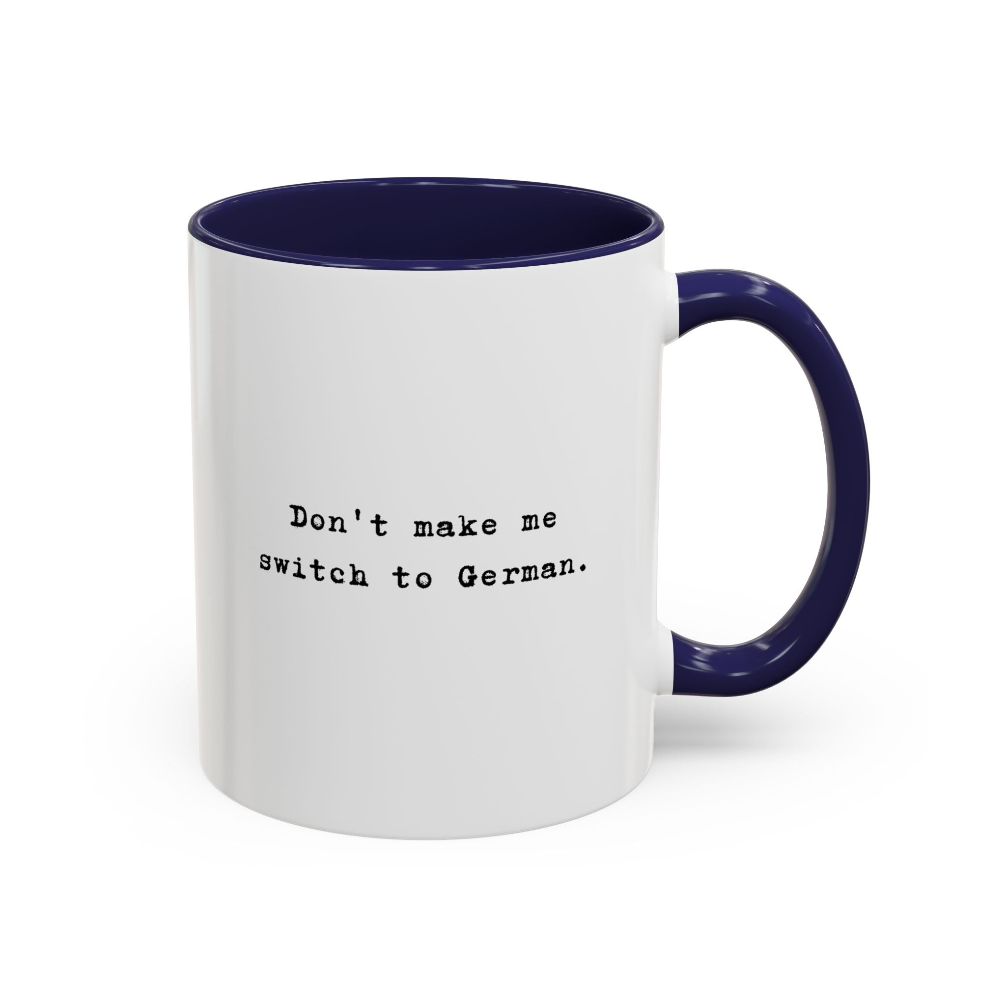 Don't Make Me Switch to German coffee mug with colorful interior and handle