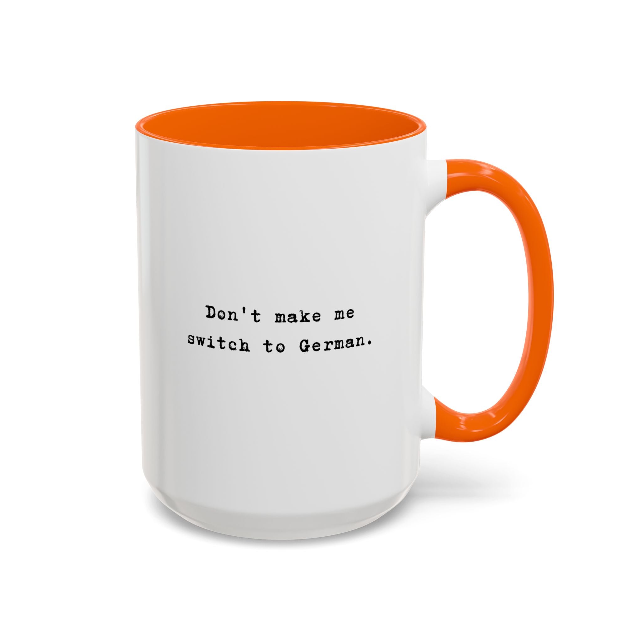 Don't Make Me Switch to German coffee mug with colorful interior and handle