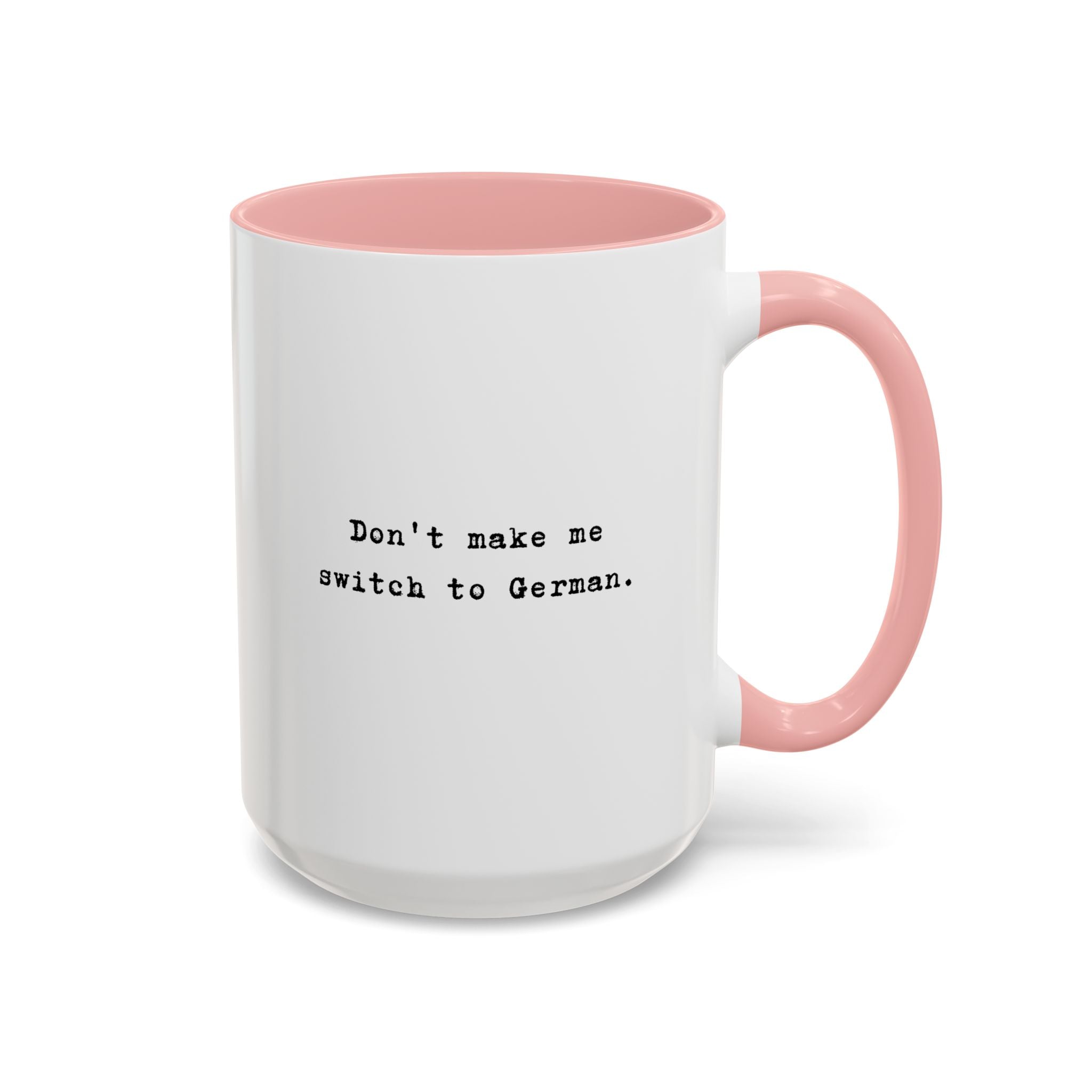 Don't Make Me Switch to German coffee mug with colorful interior and handle