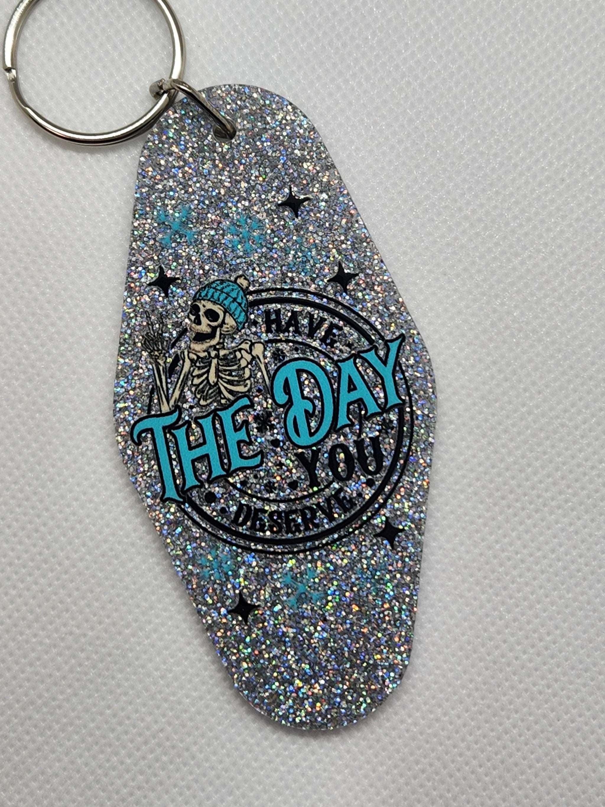 Have the Day You Deserve Motel Keychain by Hoosier Handkerchief Company
