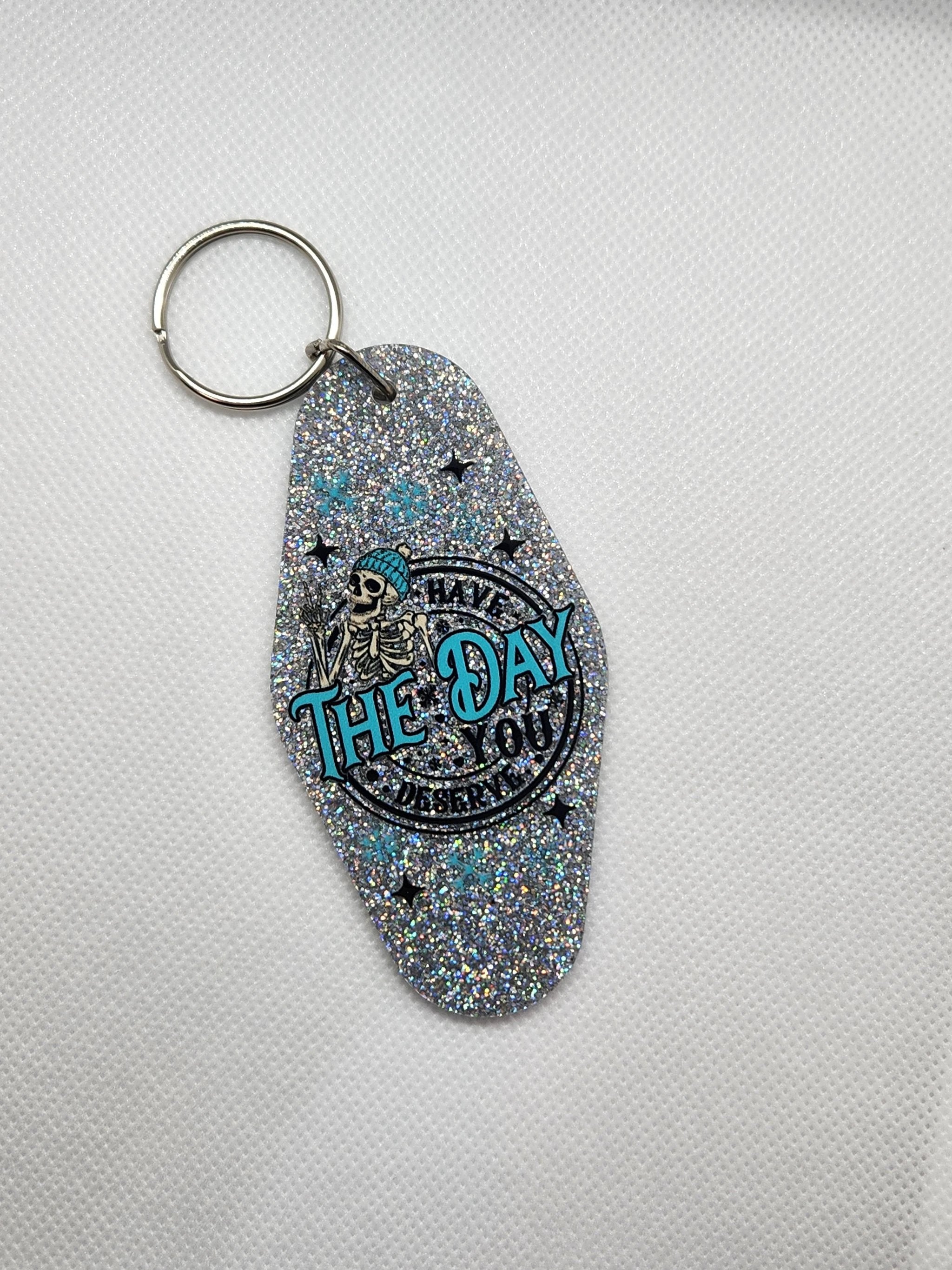 Have the Day You Deserve Motel Keychain by Hoosier Handkerchief Company