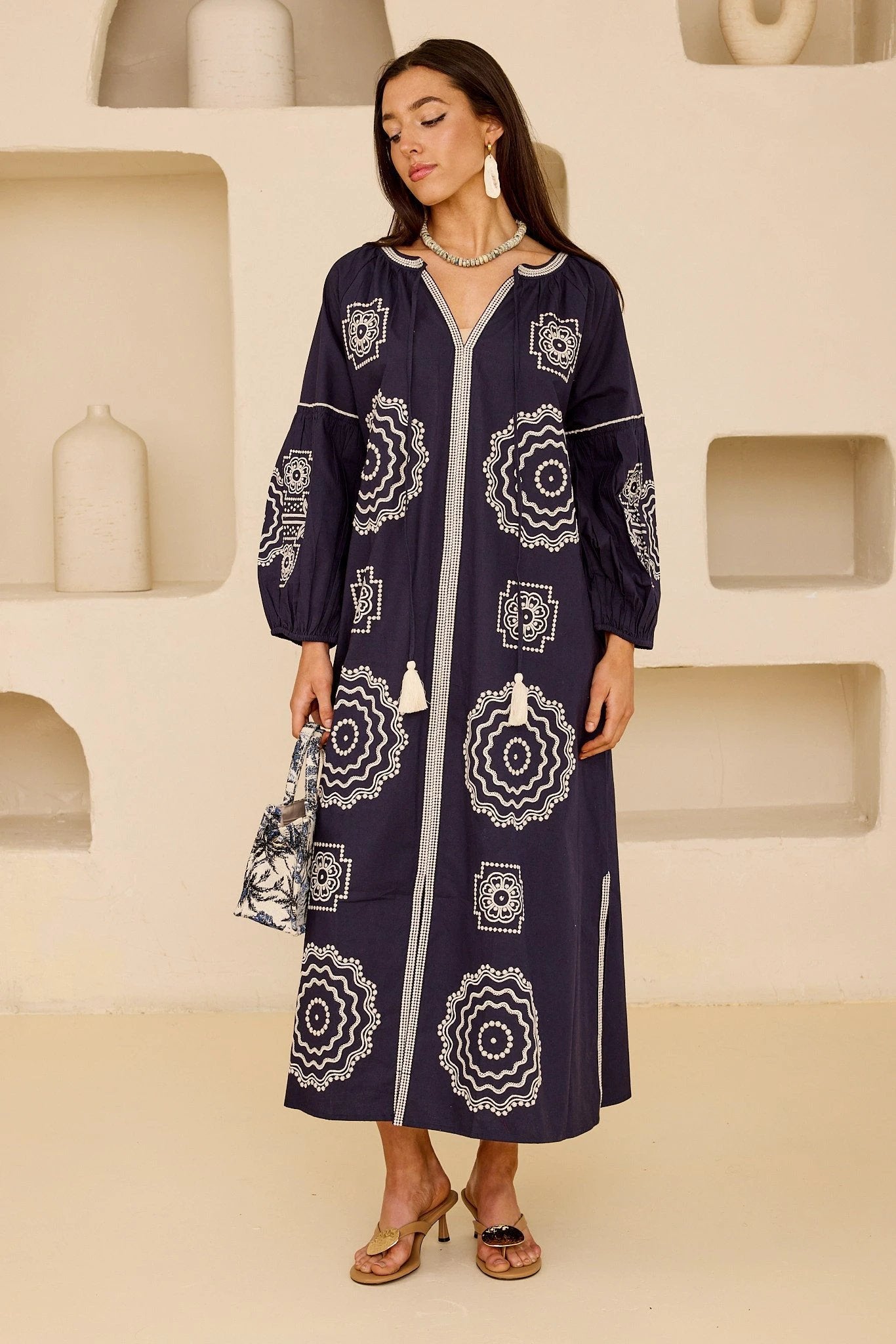Olympus by Tela Luxury Mercantile