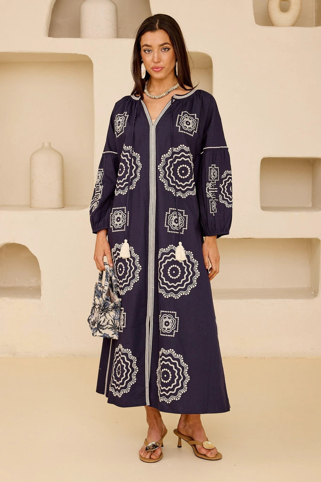 Olympus by Tela Luxury Mercantile