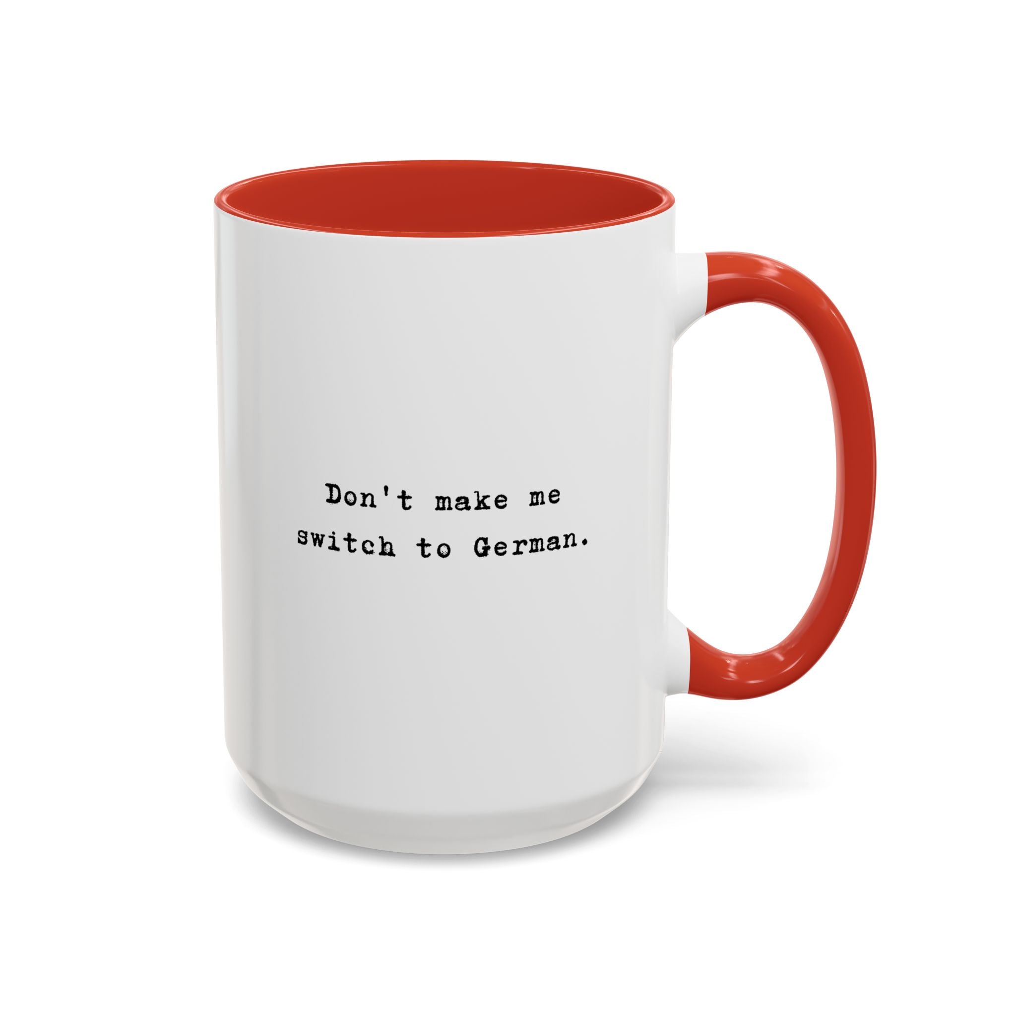 Don't Make Me Switch to German coffee mug with colorful interior and handle