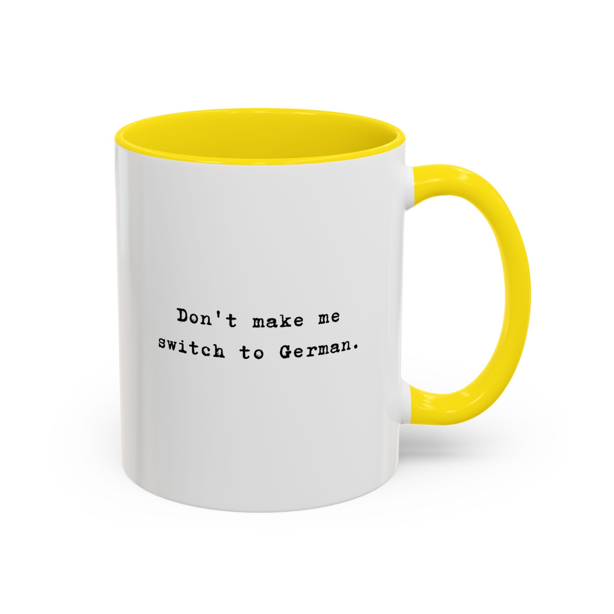 Don't Make Me Switch to German coffee mug with colorful interior and handle