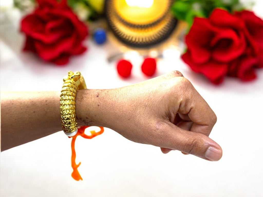 Karwachauth Party Gift - Golden Shell Bracelet, Gajra in Reusable Fabric Matki