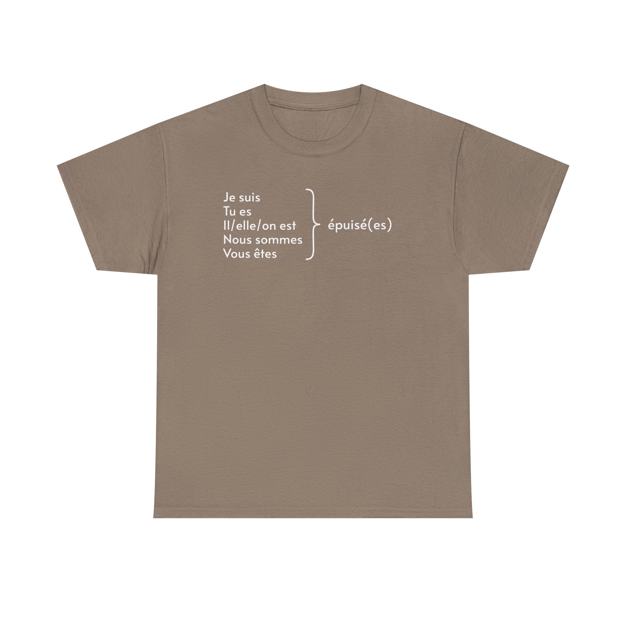 Light brown t-shirt featuring white French text displaying verb conjugations with "Je suis, Tu es, Il/elle/on est, Nous sommes, Vous êtes" followed by "épuisé(es)" (exhausted) with a bracket indicating all forms lead to being tired, photographed against a white background