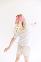 Pink Solid Oversized Bow by Evie Pearl Handmade