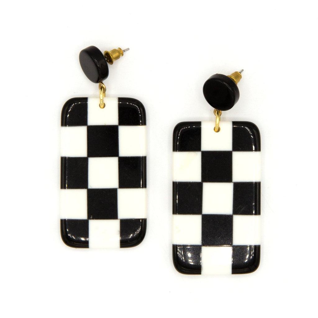 Black and white checkered earrings on a white background