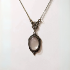 Bronze Magnifying Glass Pendant Necklace by The Bullish Store