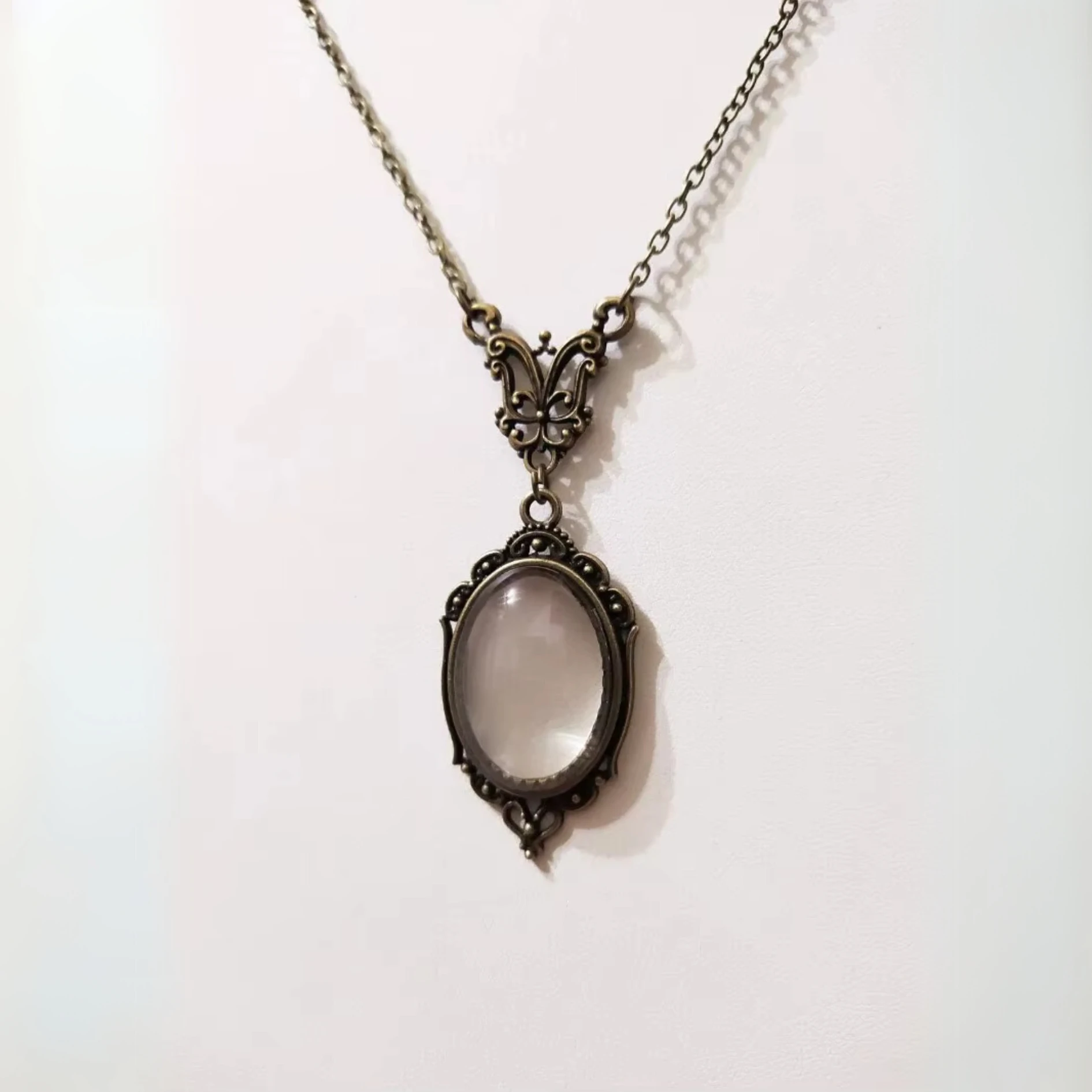Bronze Magnifying Glass Pendant Necklace by The Bullish Store