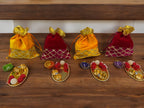 Ready-to-gift Combo Set includes One Beautiful Pearl Haldi Kumkum Plate & One Handpainted clay Diya with Potli Gift Bag Set of 4 for Diwali or Indian Festivals or Occasions as Return Gift