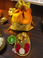 Ready-to-gift Combo Set includes One Beautiful Pearl Haldi Kumkum Plate & One Handpainted clay Diya with Potli Gift Bag Set of 4 for Diwali or Indian Festivals or Occasions as Return Gift