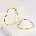 Heart Shaped Hoop Earrings (Silver or Gold) by The Bullish Store