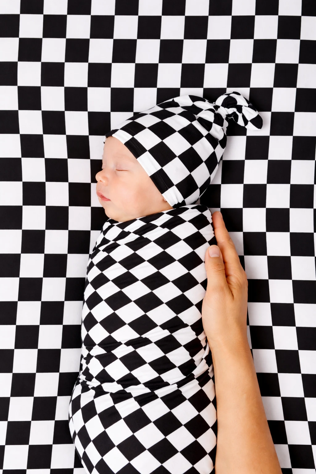 Race Black & White Checkered Stretch Swaddle by Little Mae & Co