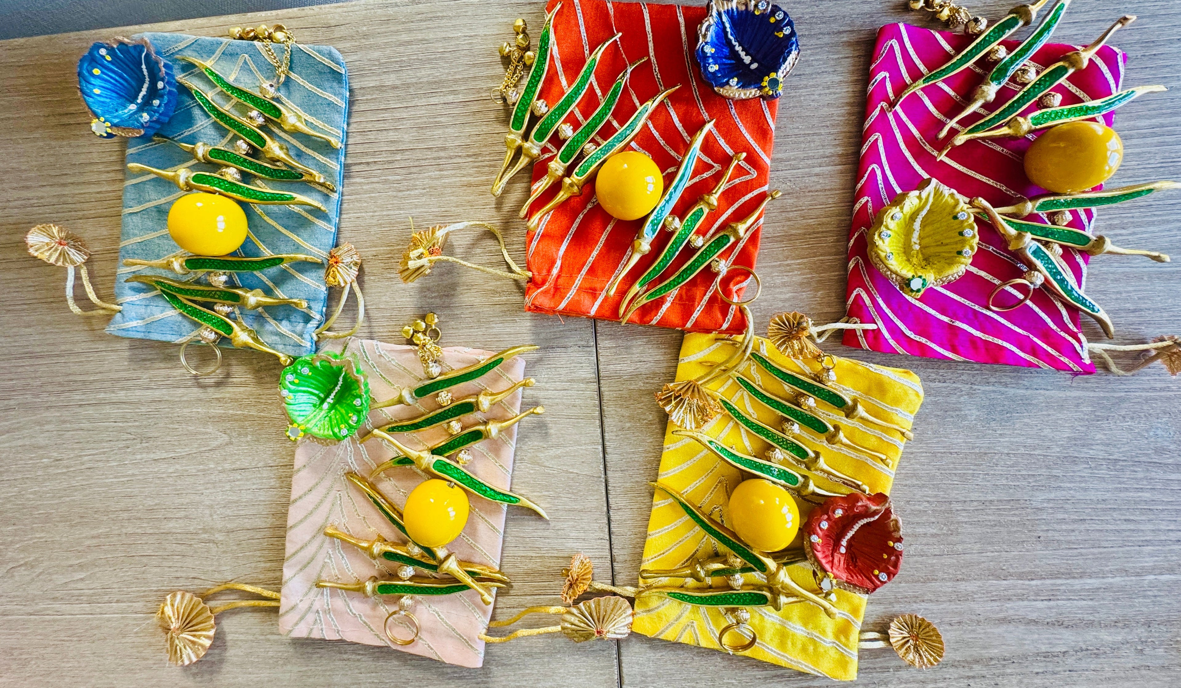 Ready-to-gift Combo Set includes One Metal Yellow & Green Nimbu Mirchi Charm & One Hand painted Clay Diya with Potli Gift Bag Set of 5 for Diwali or Indian Festivals or Occasions as Return Gift