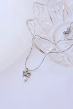 Jane Bow Necklace by Rose & Clay