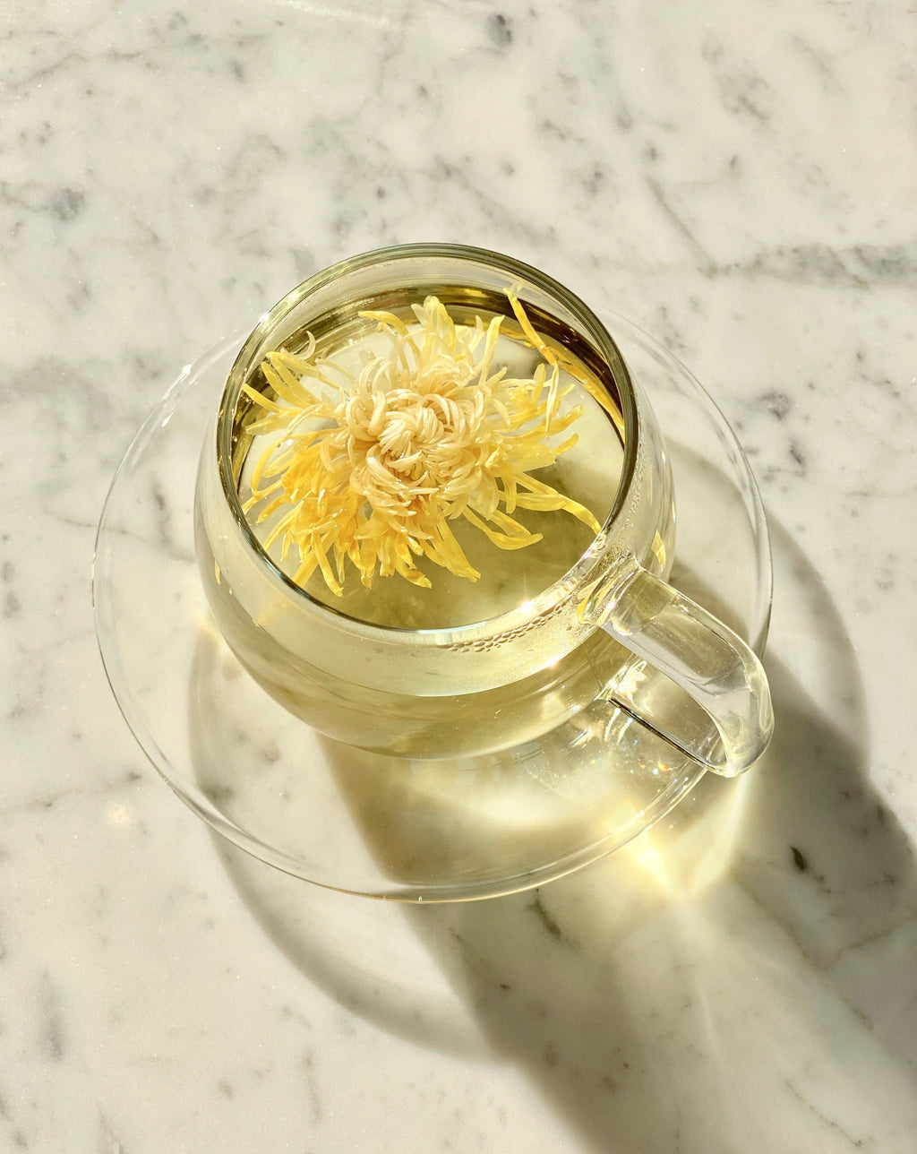 Glass cups & saucers (2)