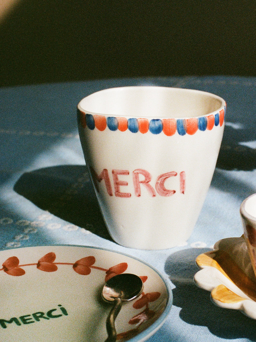 Ceramic Oval Cup with Hand Painted Merci - 10.1 oz