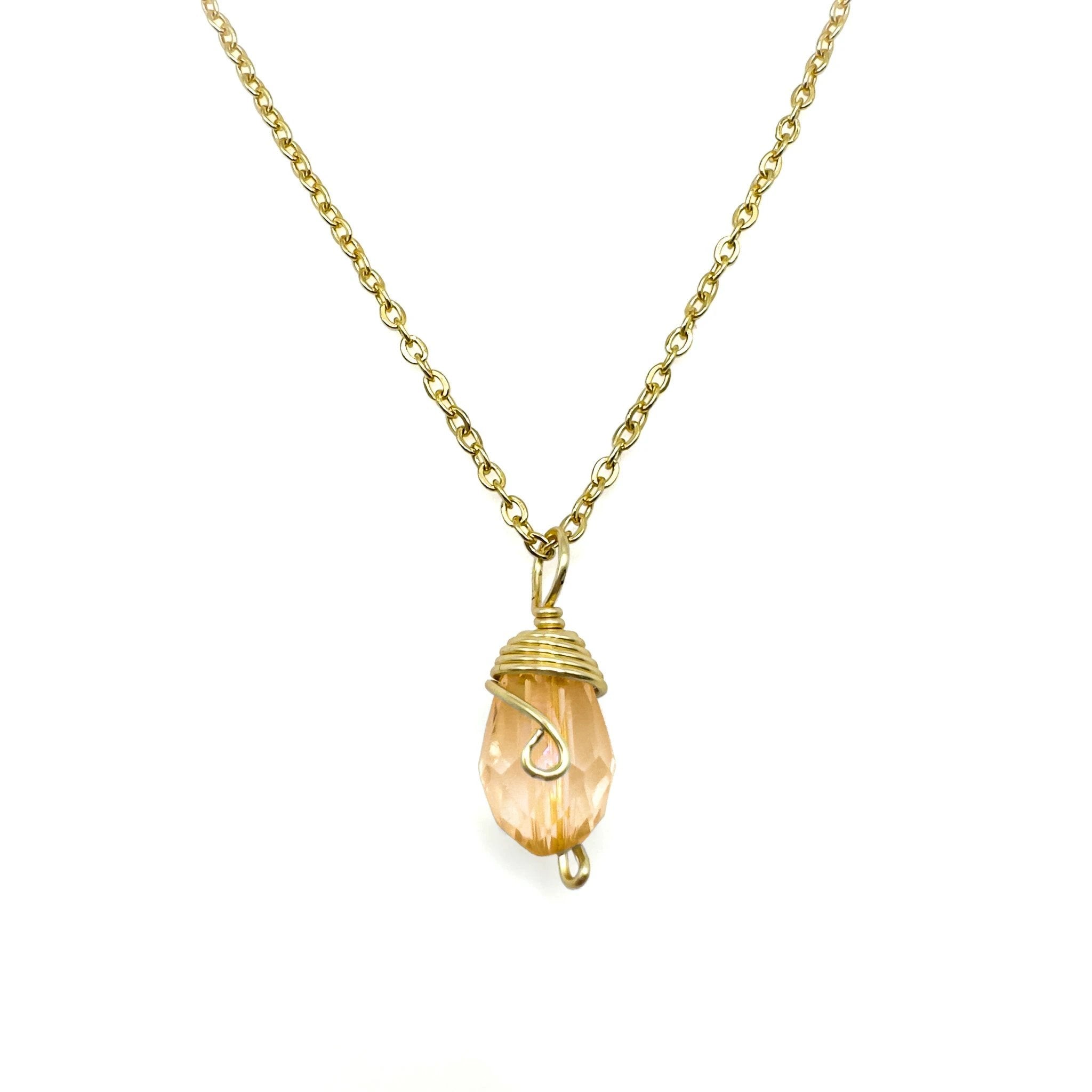 Gold Birthstone necklace by Alegria Accessories Inc