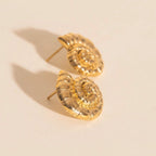 Shell Swirl Stud Earrings by Oh Clementine