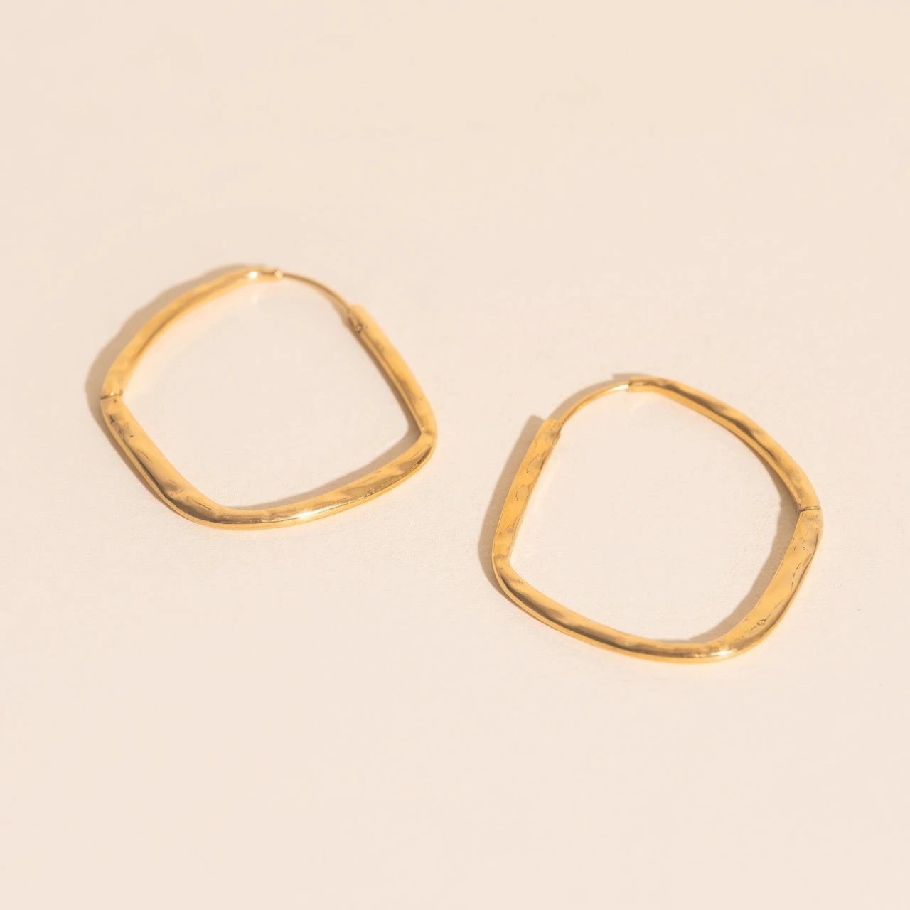 Titanium Hammered Oblong Huggie Hoop Earrings by Oh Clementine