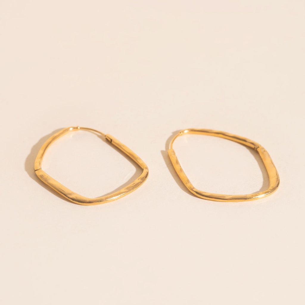 Titanium Hammered Oblong Huggie Hoop Earrings by Oh Clementine