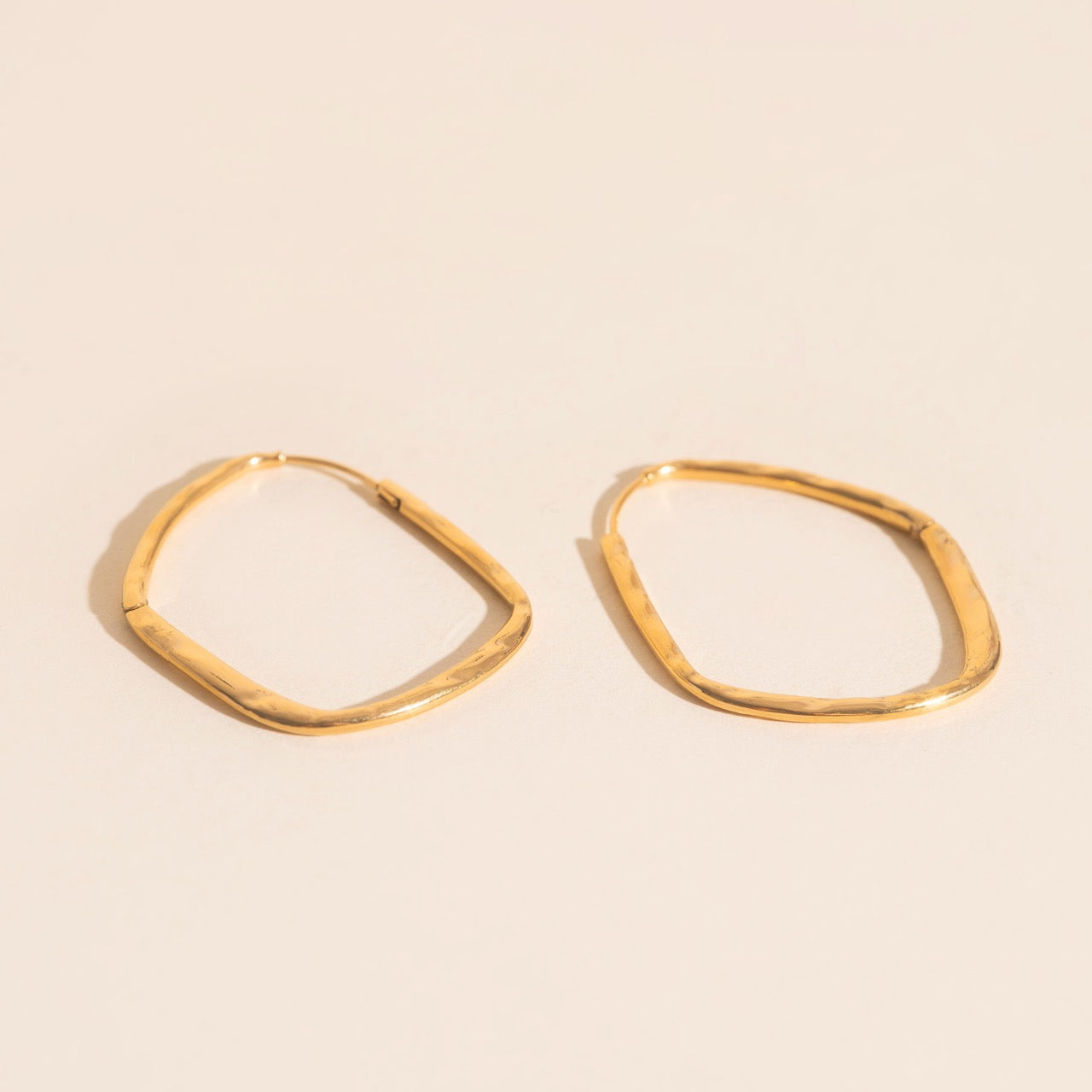 Titanium Hammered Oblong Huggie Hoop Earrings by Oh Clementine