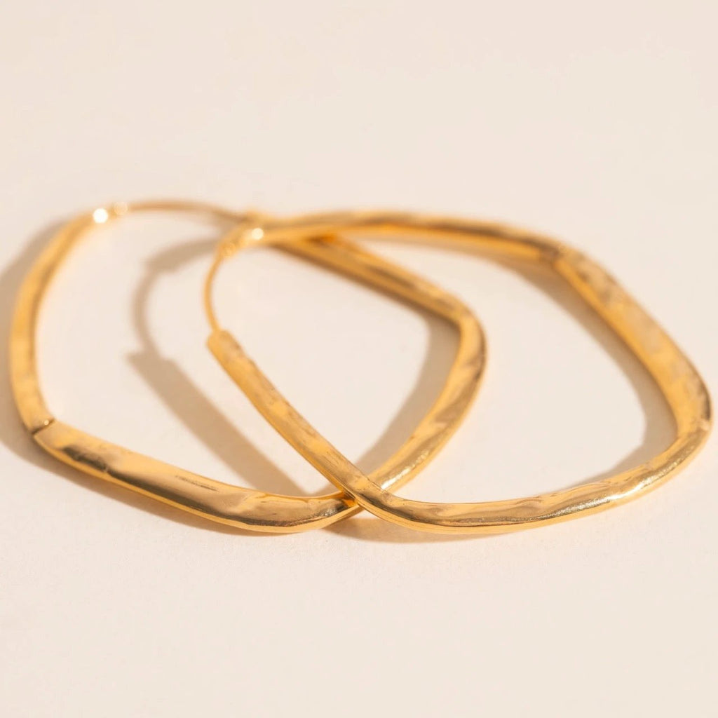 Titanium Hammered Oblong Huggie Hoop Earrings by Oh Clementine