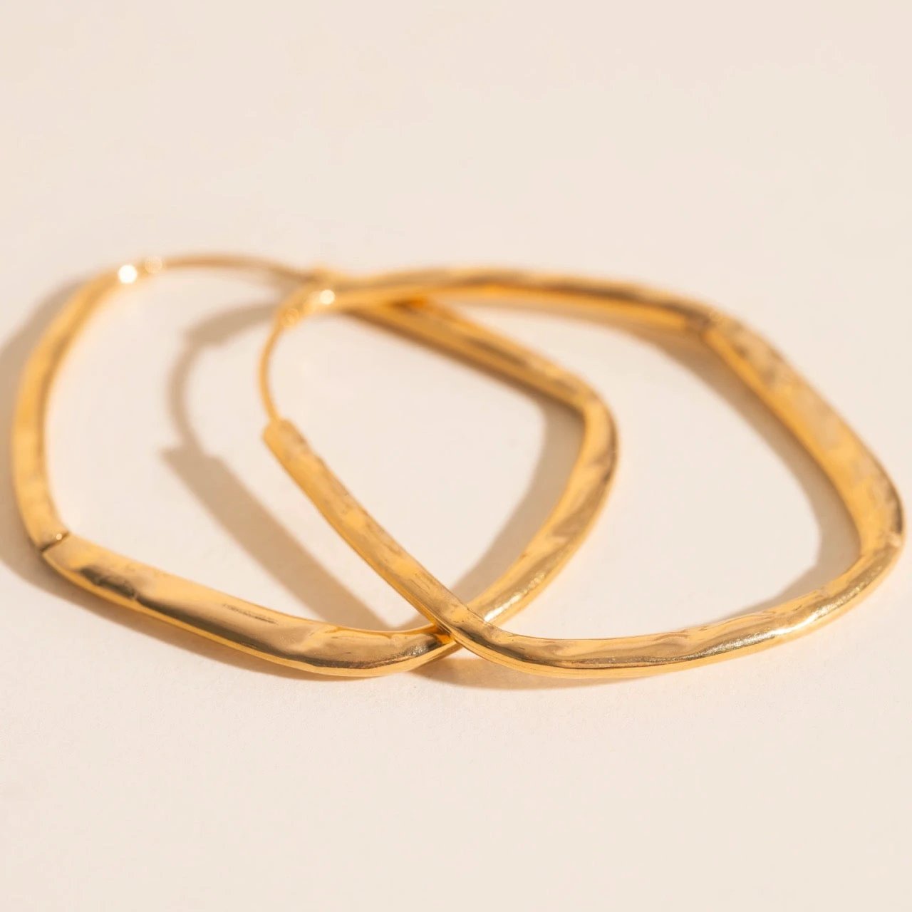 Titanium Hammered Oblong Huggie Hoop Earrings by Oh Clementine