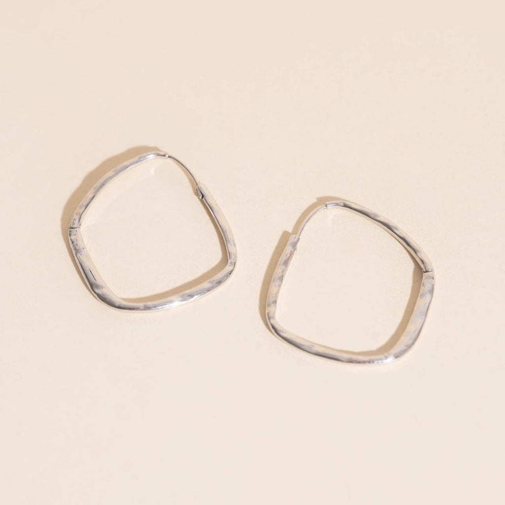 Titanium Hammered Oblong Huggie Hoop Earrings by Oh Clementine