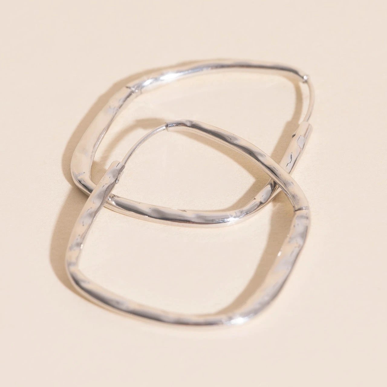Titanium Hammered Oblong Huggie Hoop Earrings by Oh Clementine