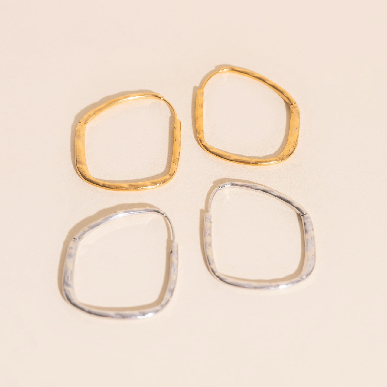 Titanium Hammered Oblong Huggie Hoop Earrings by Oh Clementine
