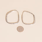 Titanium Hammered Oblong Huggie Hoop Earrings by Oh Clementine