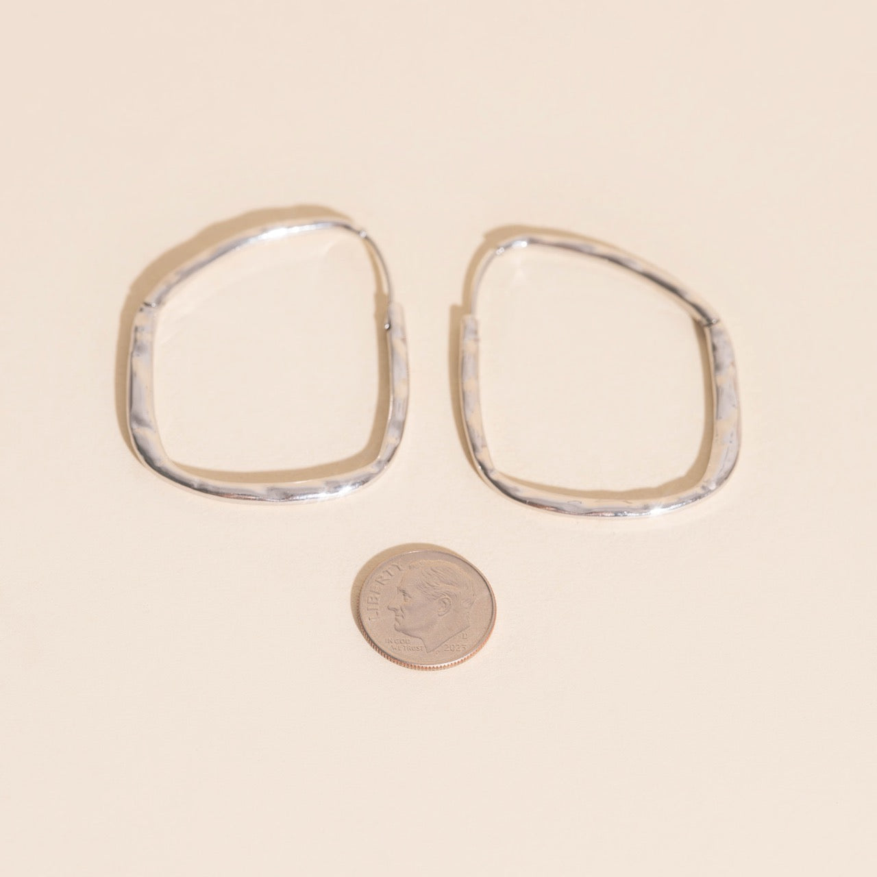 Titanium Hammered Oblong Huggie Hoop Earrings by Oh Clementine