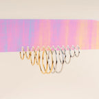 Circle Rounded Huggie Hoop Earrings by Oh Clementine