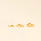 Smooth Tiny Huggie Hoop Earrings by Oh Clementine