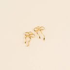 Dainty Bow Huggie Hoop Charms by Oh Clementine