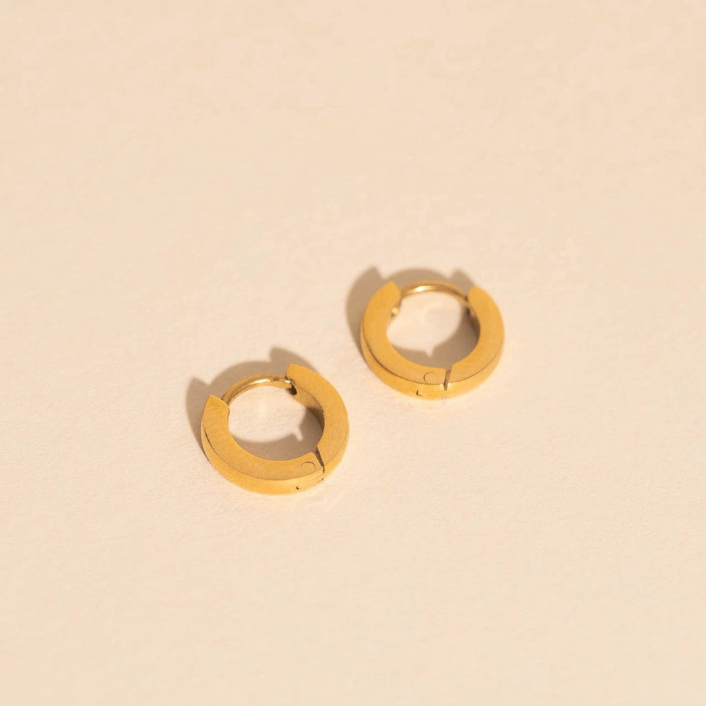 Smooth Tiny Huggie Hoop Earrings by Oh Clementine