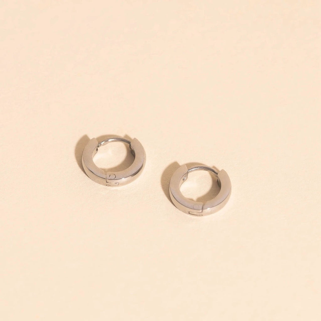 Smooth Tiny Huggie Hoop Earrings by Oh Clementine