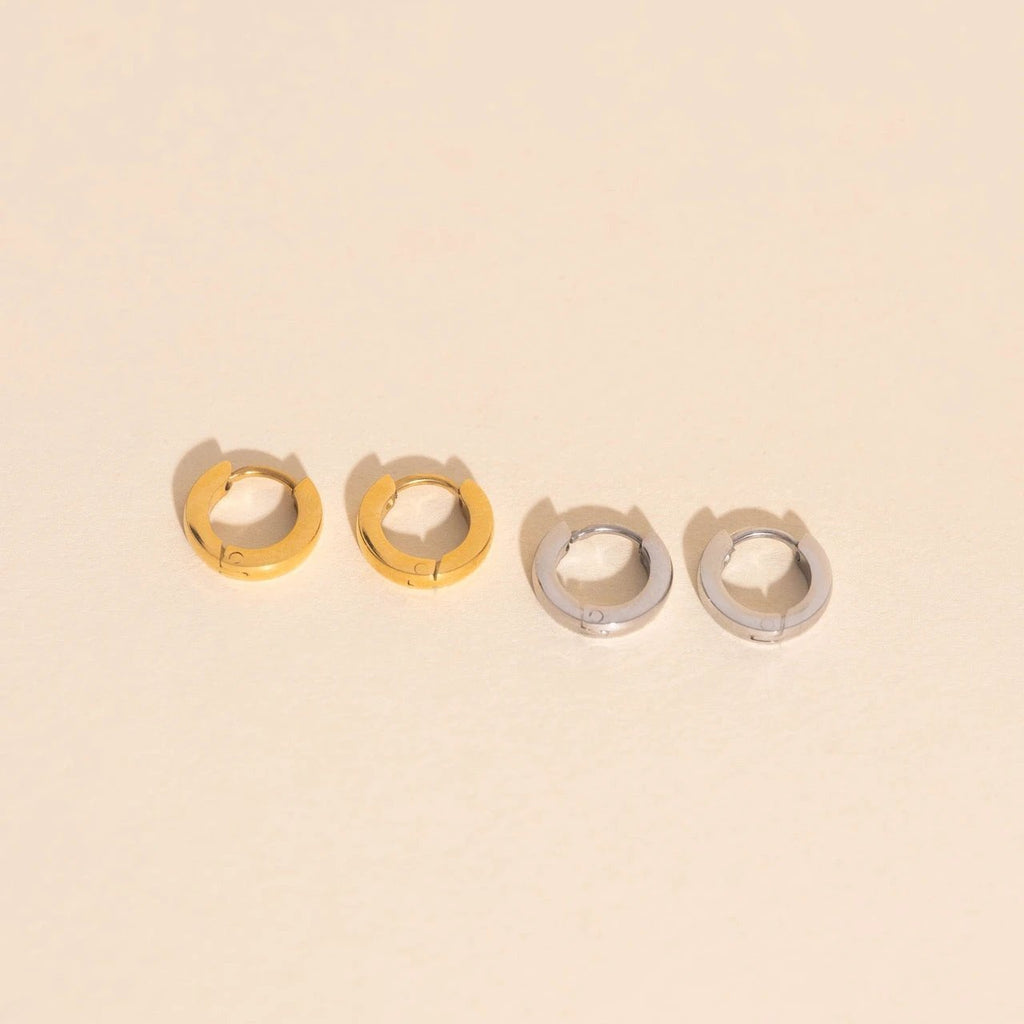 Smooth Tiny Huggie Hoop Earrings by Oh Clementine