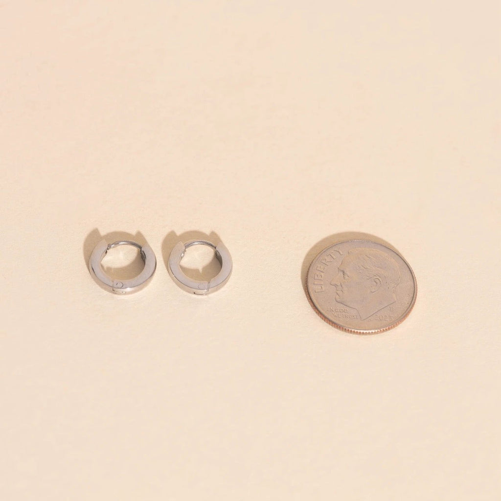 Smooth Tiny Huggie Hoop Earrings by Oh Clementine