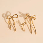 Jumbo Bow Stud Earrings by Oh Clementine