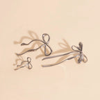 Jumbo Bow Stud Earrings by Oh Clementine