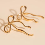 Jumbo Bow Stud Earrings by Oh Clementine